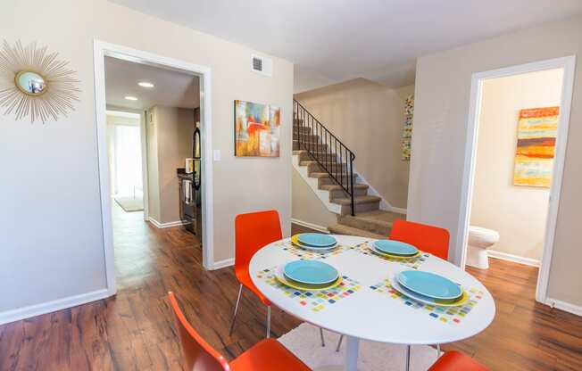 a dining area with a table and chairsat Broadway at East Atlanta, Atlanta