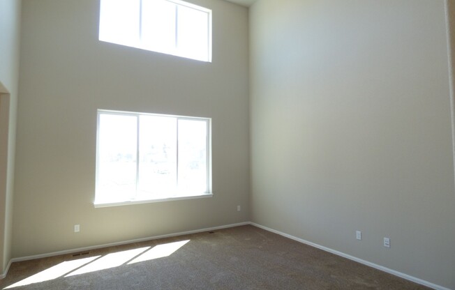 Lovely 2 Story Home in Windsor's Raindance Community! Corner Lot!