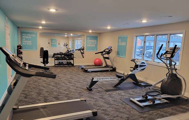 fitness center at Retreat on 6th Apartments