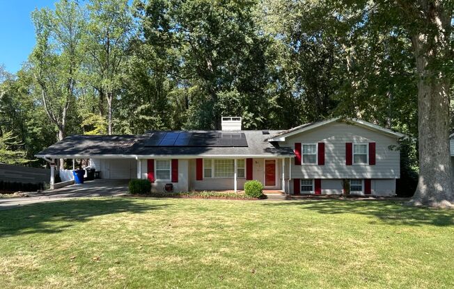 Incredible 5BD, 3BA North Raleigh House with Large Fenced Backyard, Driveway, and Covered Parking