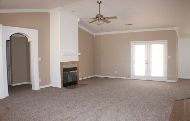 Charming 3-Bedroom Home with Fireplace, Spacious Backyard & Attached Garage in California City!