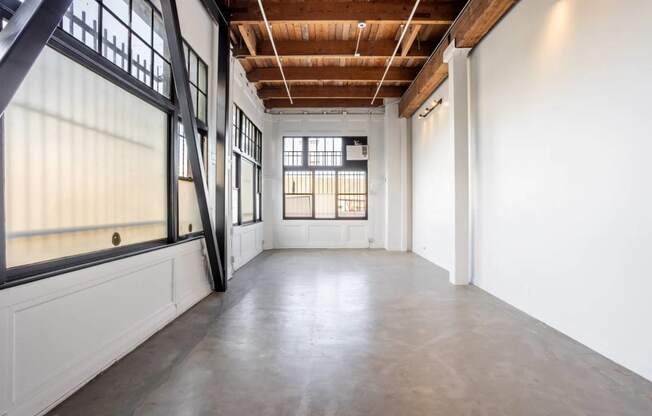 a hallway with rainbow colored lights on the floor