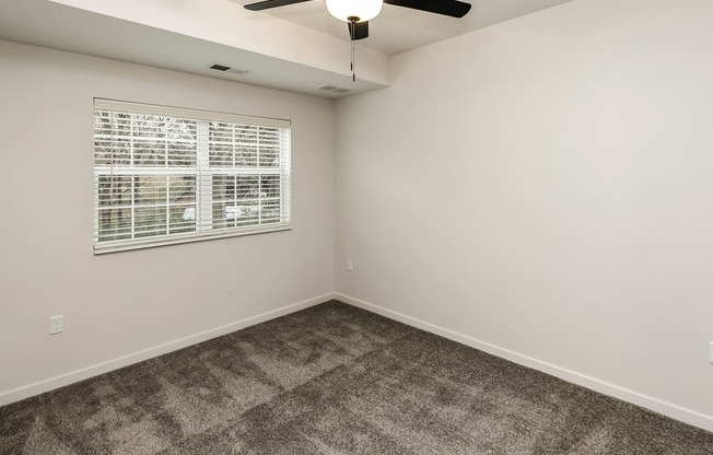 New building with white and dark color schemes with one, two and three bedroom apartment homes at CopperCreek Apartments in Council Bluffs, IA