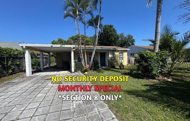 Large 4-1 house with car port and fenced backyard