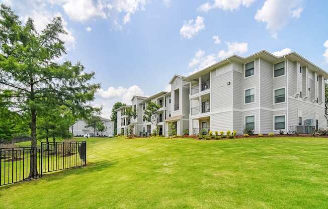 the preserve at ballantyne commons apartments exterior view of lawn and buildings
