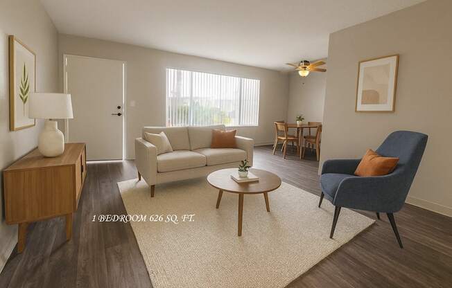 A living room with a couch, chair, and coffee table.