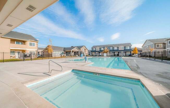 the preserve at ballantyne commons pool and apartment buildings