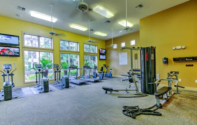 the fitness center at the village at sunburst park apartments ga