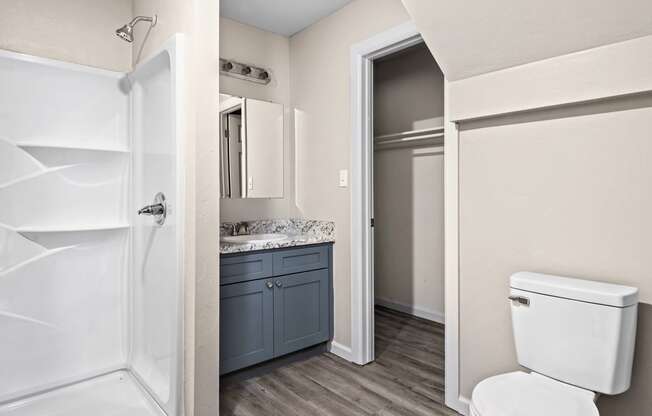 a bathroom with a toilet and a sink and a shower at Diamond Ridge Townhomes, Oklahoma ,73114