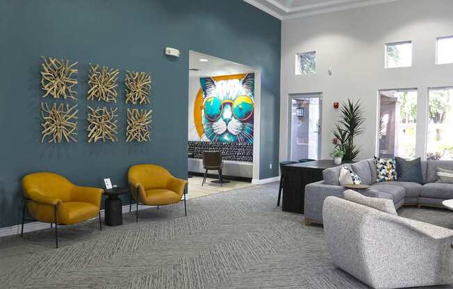 Rec room with couch and Tv and sitting chairs