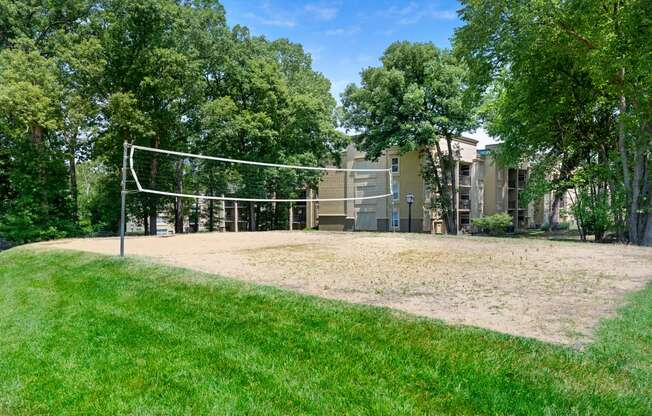 the volleyball court is in front of the building