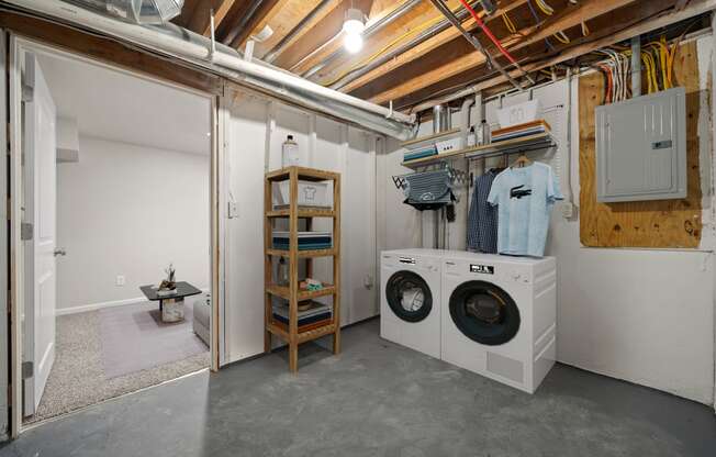 a laundry room with a washing machine and a dryer