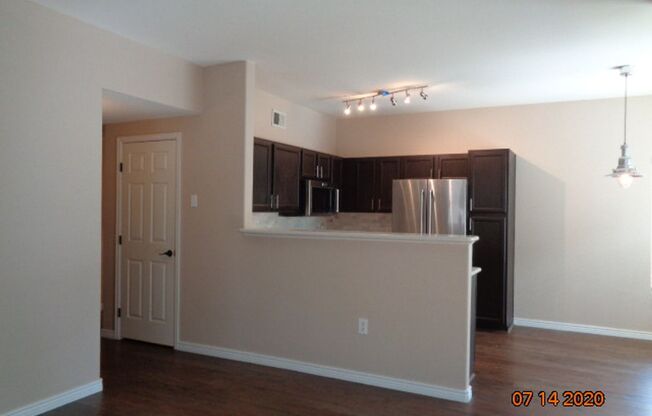 Stunning 2 BR/2 BA Lower Level Condo w/ 1 Car Detached Garage!!