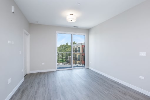 Spacious living room that features luxury vinyl plank flooring