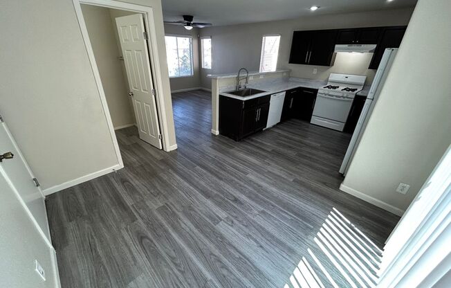 BEAUTIFUL 2 BEDROOM, 2.5 BATHROOM HOME WITH AN ATTACHED GARAGE LOCATED IN A WELL-MAINTAINED COMMUNITY