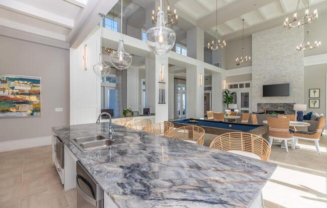 a kitchen with an island in the middle of a room