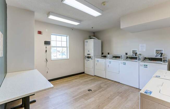 A laundry room with a washer and dryer.