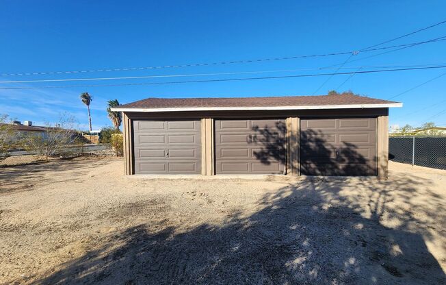 REMODELED 4 BEDROOM 2 BATH WITH 3 CAR GARAGE!