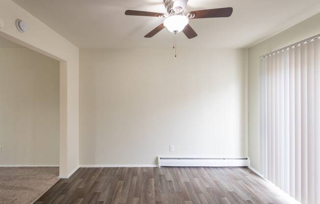 This is a photo of the dining room of the 1004 square foot, 2 bedroom/1 bath Townhome with stackable washer/dryer floor plan at Colonial Ridge Apartments in the Pleasant Ridge neighborhood of Cincinnati, OH.