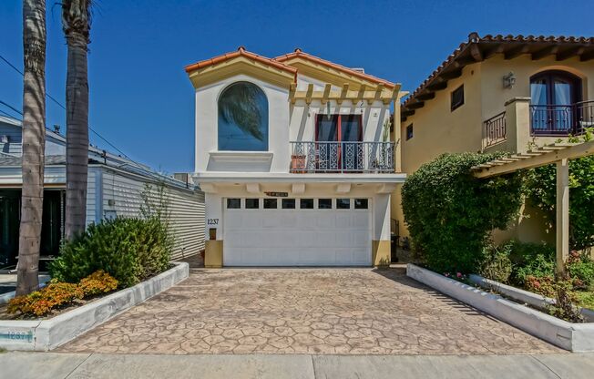 CUSTOM, ECLECTIC & CHARMING, 2100 SQ FT, HERMOSA HILLTOP HOME W/ OCEAN VIEWS, PATIO/YARD, 2 BALCONIES & 2-CAR GARAGE CLOSE TO SHOPPING, RESTAURANTS, & JUST 1 MILE TO BEACH/HB PIER!