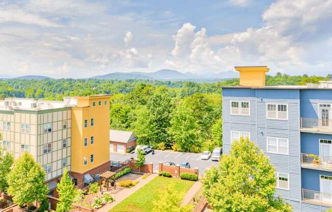 aerial view of the lofts at reynolds village apartment homes and mountain skyline