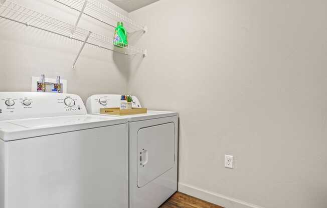 A laundry room with a washer and dryer.