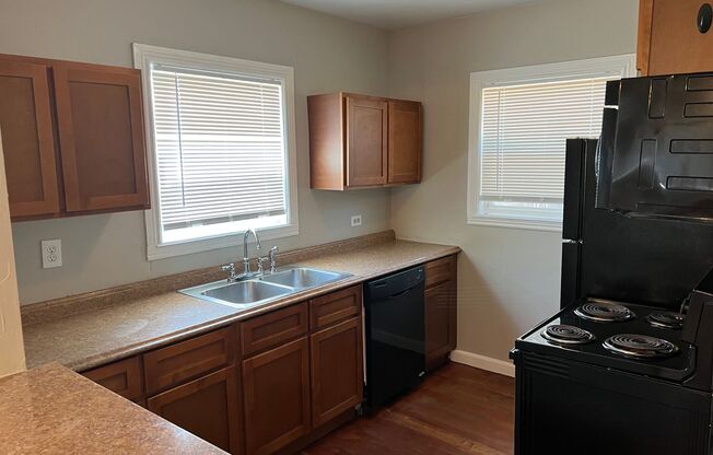 Four Bed Two Bath, Two Kitchen Home Just Blocks from Regis University!