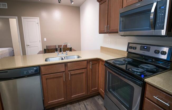 Modern Kitchens with Clean Steel Appliances at Four Seasons Apartments & Townhomes, Utah