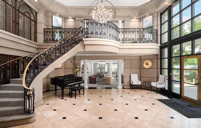 a grand foyer entrance with two level resident club house lounge