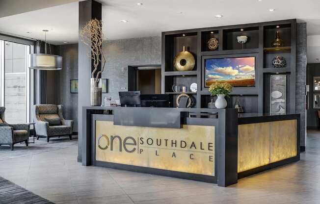 Concierge desk with the words "One Southdale Place" written on it