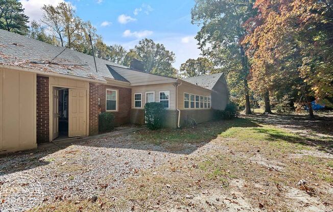 Spacious brick ranch in the heart of Louisburg!