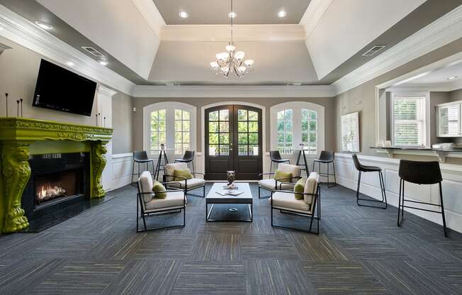 Modern Clubhouse with seating  located at St. Andrews Apartments in Johns Creek, GA 30022