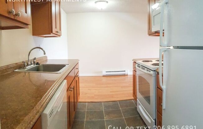 3023 14 AVE W