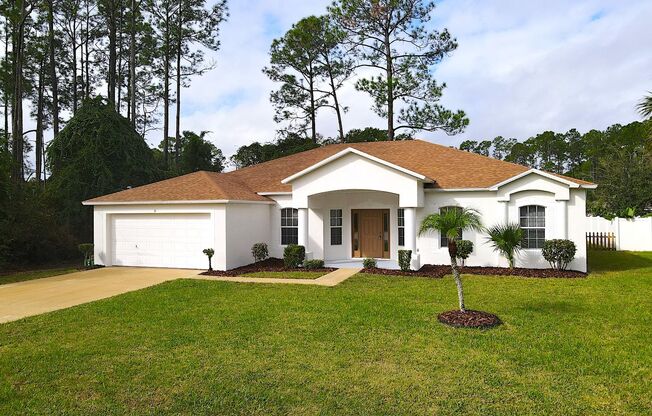 Spacious 4 Bed 2 Bath Home in Palm Coast w Fenced Yard!