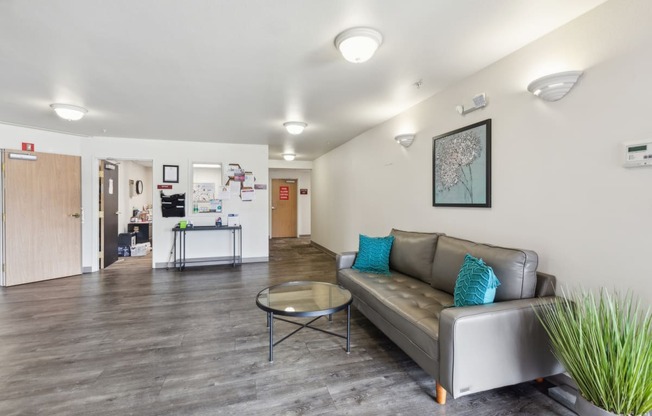 a living room with a couch and a coffee table