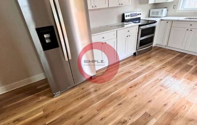 Massive 5 bedroom 1 bath house with fence in yard