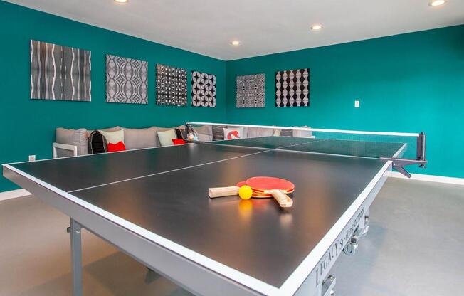 a ping pong table in the game room