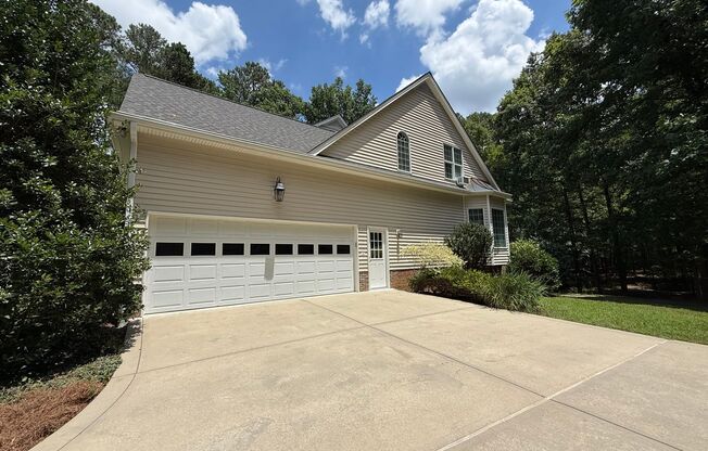 Tranquil and Secluded Raleigh Home with Unique Bonus Features Located on a 7+ Acre Lot on a Private Street with Plenty of Privacy and Outdoor Space
