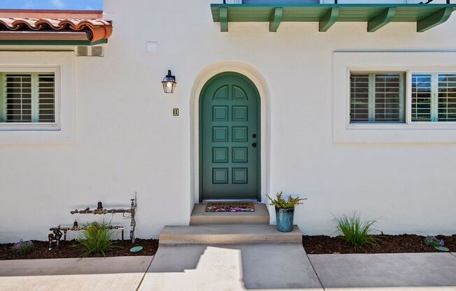 Charmingly remodeled three bedroom two and a half bath Spanish duplex in serene Hidden Valley!