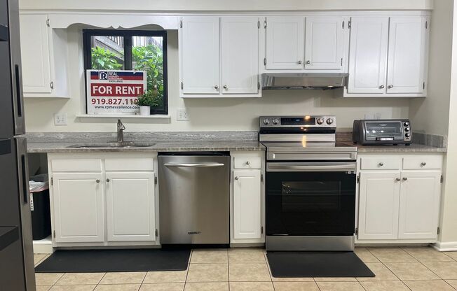 North Raleigh Move-In Ready Condo, On Ground Floor With Secluded Patio!