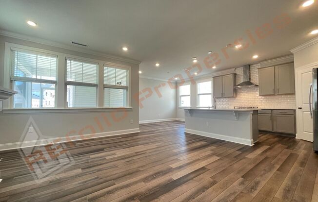 Beautiful 4 Bedroom 2.5 Bath Home with 2 Car Rear Entry Garage, First Floor Primary Bedroom Suite & Fireplace Plus Fiber Internet Included in Edge of Auburn Subdivision, Available June 6th!