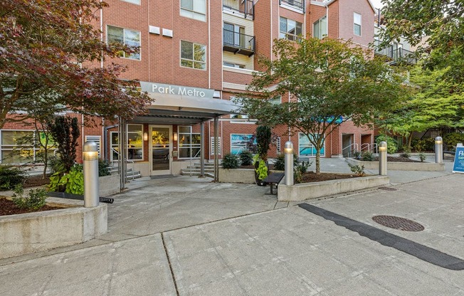 A building with a sign that says "Park Metro" in front of it.