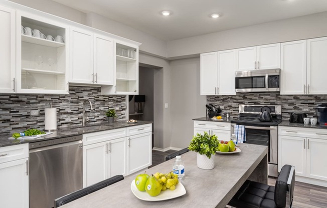 Gourmet Kitchen With Island at Park Heights by the Lake Apartments, Chicago, IL