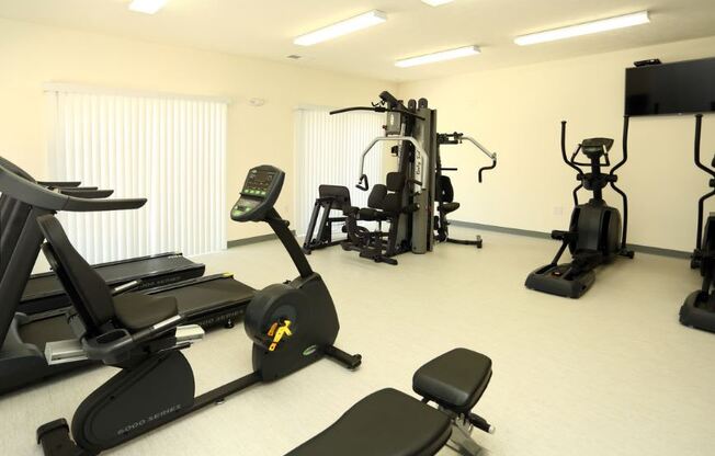 Cardio Machines In Gym at Withington Apartments, MRD Apartments, Jackson, Michigan