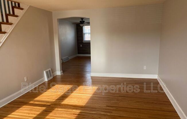 113 W MADISON AVE