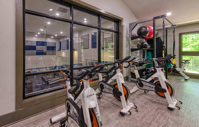 Wynnwood Vinings two story fitness center interior room filled with lots of bikes and exercise equipment