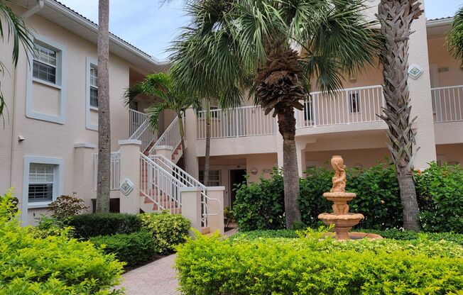 Annual turnkey furnished 2/2 ground floor unit in gated Plaza De Flores in Palmer Ranch.