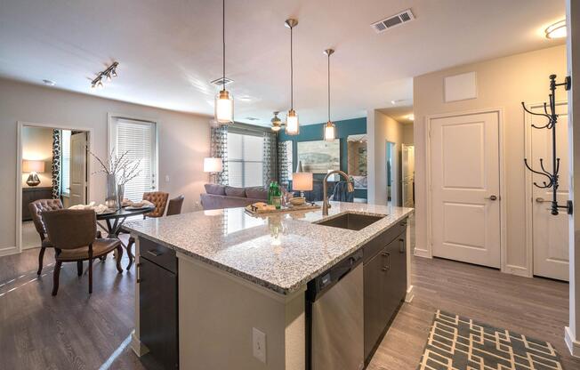 a kitchen with an island in the middle of a room