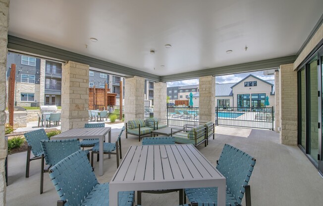 Unwind in the inviting outdoor space at Sage at Celina Residences, where stylish seating and serene views enhance your leisure time. Perfectly designed for relaxation and connection, come see it for yourself today!