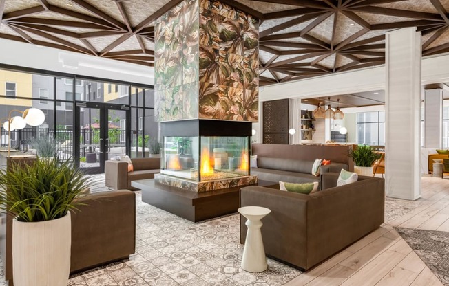 Lobby with couches and a fireplace